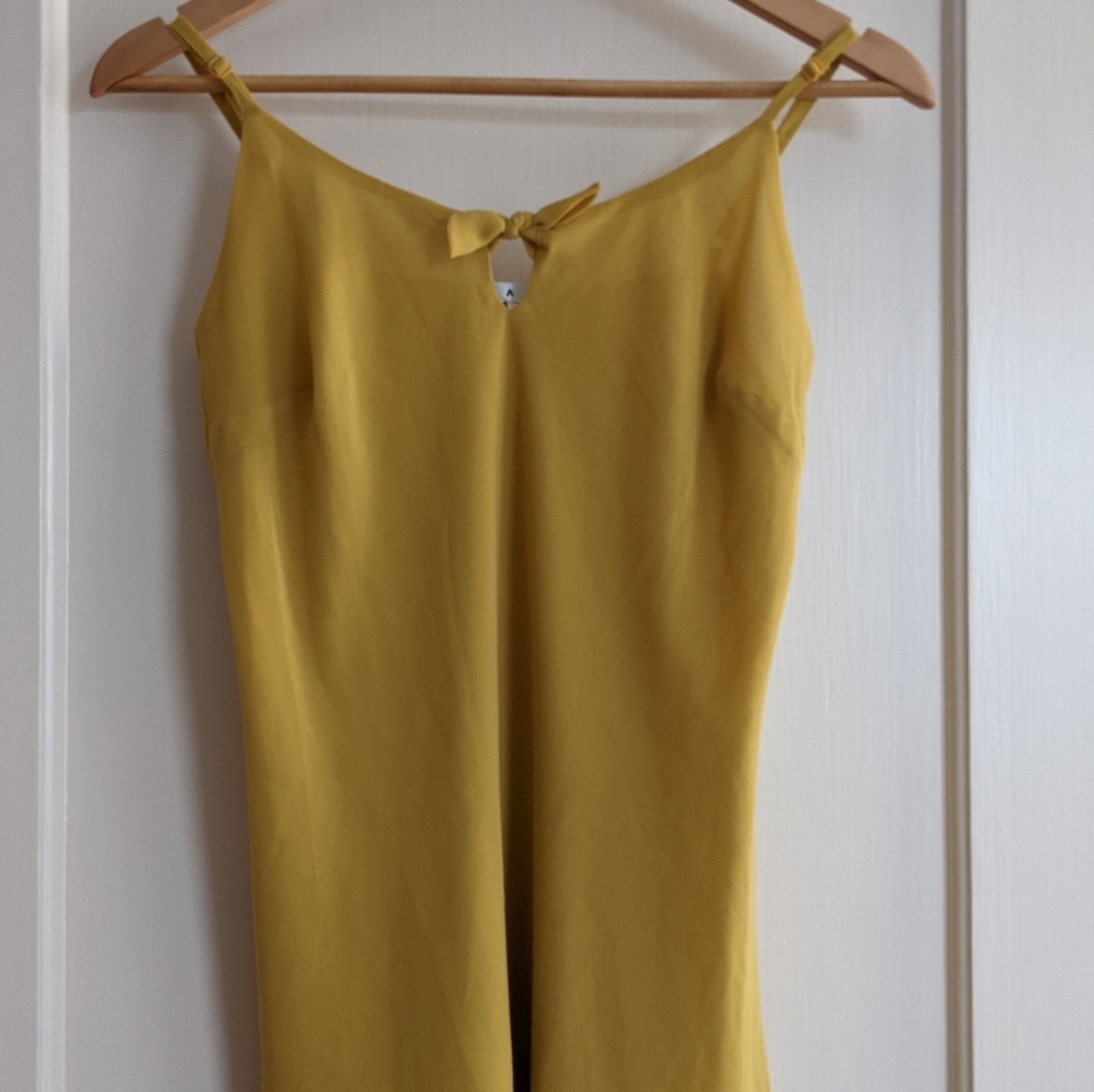 Cabi top 551 in EUC mustard yellow